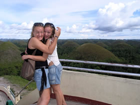 crazy daughters on Chocolate hills, Philippines